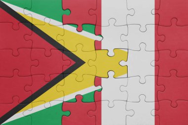 Peru 'nun renkli ulusal bayrağı ve Guyana bayrağı ile bulmaca. konsept