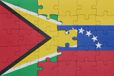 Venezuela 'nın renkli ulusal bayrağı ve Guyana bayrağı ile bulmaca. konsept