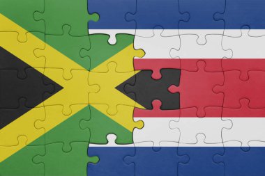 Kosta Rika 'nın renkli ulusal bayrağı ve Jamaika bayrağının bulmacası. konsept