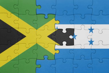 Honduras 'ın renkli ulusal bayrağı ve Jamaika bayrağının bulmacası. konsept