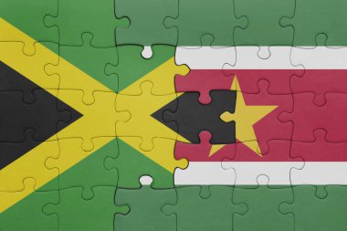 Surinam 'ın renkli ulusal bayrağı ve Jamaika bayrağıyla ilgili bulmacalar. konsept