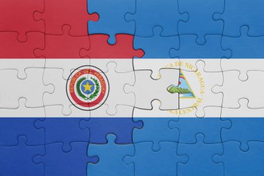 Nikaragua 'nın renkli ulusal bayrağı ve Paraguay bayrağı bulmacası. konsept