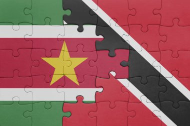 Trinidad, Tobago ve Surinam bayrağının renkli ulusal bayrağıyla bulmaca. konsept