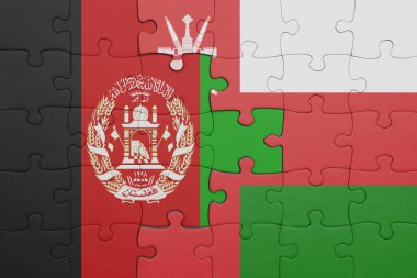 Umman 'ın renkli ulusal bayrağı ve Afganistan bayrağıyla ilgili bulmacalar. konsept