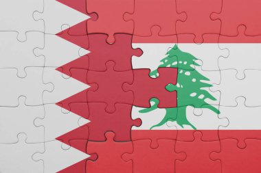Lübnan 'ın renkli ulusal bayrağı ve bahreyn bayrağı ile bulmaca. konsept