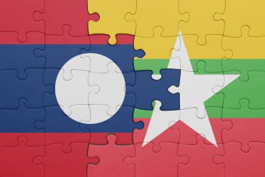 Laos 'un renkli ulusal bayrağı ve Myanmar bayrağı ile bulmaca. konsept
