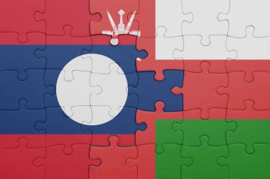 Laos 'un renkli ulusal bayrağı ve Umman bayrağı ile bulmaca. konsept