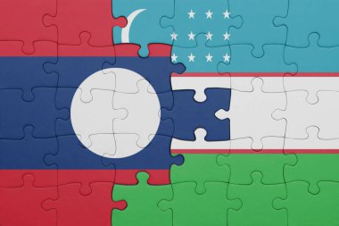 Laos ve Özbekistan bayrağının renkli ulusal bayrağıyla bulmaca. konsept