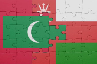 Maldivler ve Umman bayrağının renkli ulusal bayrağıyla bulmaca. konsept
