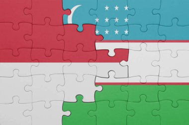 Özbekistan 'ın renkli ulusal bayrağı ve Endonezya bayrağı. konsept