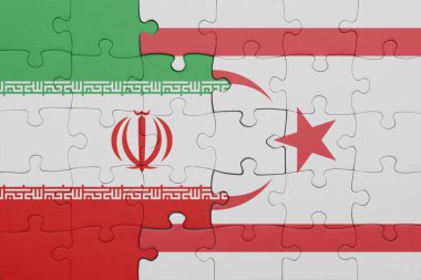 Kuzey Kıbrıs 'ın renkli ulusal bayrağı ve İran bayrağının bulmacası. konsept