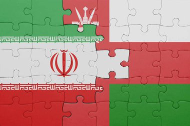 Umman 'ın renkli ulusal bayrağı ve İran bayrağı ile bulmaca. konsept