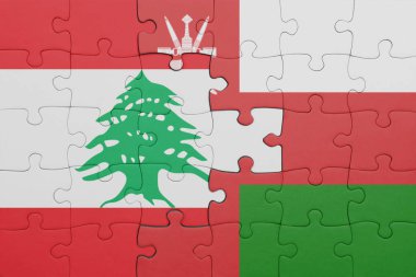 Lübnan 'ın renkli ulusal bayrağı ve Umman bayrağı ile bulmaca. konsept