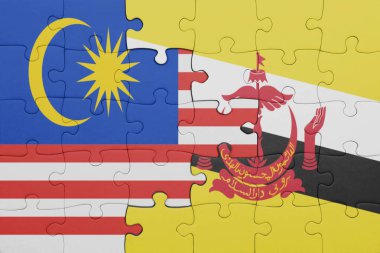 Renkli milli esmer bayrağı ve Malezya bayrağı bulmacası. konsept