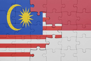 Endonezya 'nın renkli ulusal bayrağı ve Malezya bayrağı bulmacası. konsept