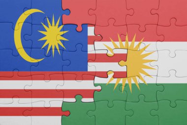 Kürdistan 'ın renkli ulusal bayrağı ve Malezya bayrağının bulmacası. konsept