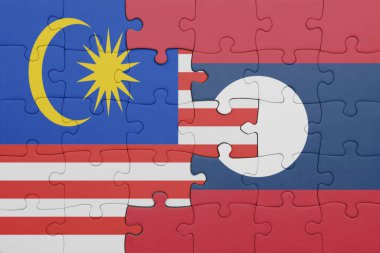 Laos 'un renkli ulusal bayrağı ve Malezya bayrağı bulmacası. konsept