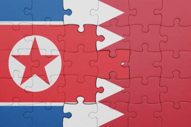 Bahreyn ve Kuzey Kore bayrağının renkli ulusal bayrağıyla bulmaca. konsept