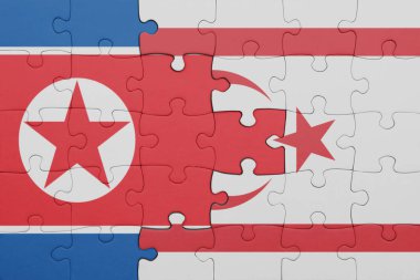 Kuzey Kıbrıs 'ın renkli ulusal bayrağı ve Kuzey Kore bayrağının bulmacası. konsept