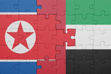Birleşik Arap Emirlikleri 'nin renkli ulusal bayrağı ve Kuzey Kore bayrağının bulmacası. konsept