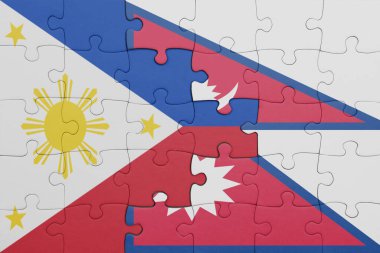 Nepal 'in renkli ulusal bayrağı ve Filipinler bayrağı ile bulmaca. konsept