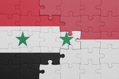 Endonezya 'nın renkli ulusal bayrağı ve Suriye bayrağının bulmacası. konsept
