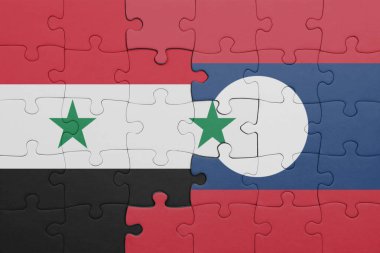Suriye bayrağı ve laoların renkli ulusal bayrağıyla bulmaca. konsept