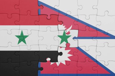 Nepal ve Suriye bayrağının renkli ulusal bayrağıyla bulmaca. konsept