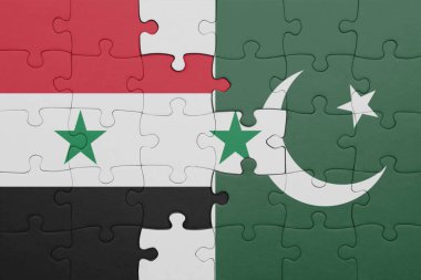 Pakistan ve Suriye bayrağının renkli ulusal bayrağıyla bulmaca. konsept