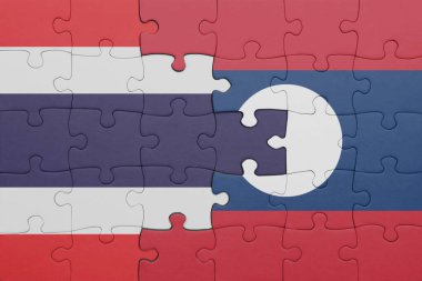Tayland 'ın renkli ulusal bayrağı ve laos bayrağıyla bulmaca. konsept