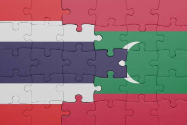 Tayland bayrağı ve maldivlerin bayrağıyla dolu renkli bir bulmaca. konsept