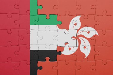 Hong Kong 'un renkli ulusal bayrağı ve Birleşik Arap Emirliklerinin bayrağı. konsept