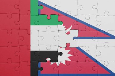 Nepal 'in renkli ulusal bayrağı ve Birleşik Arap Emirliklerinin bayrağı. konsept