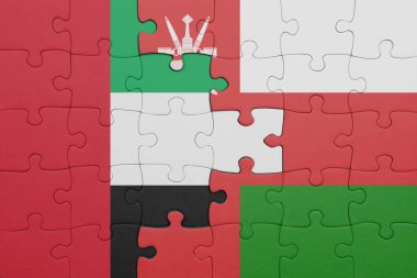 Umman 'ın renkli ulusal bayrağı ve Birleşik Arap Emirliklerinin bayrağı. konsept