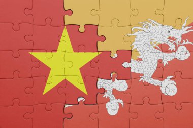 Vietnam 'ın renkli ulusal bayrağı ve bhutan bayrağı ile bulmaca. konsept