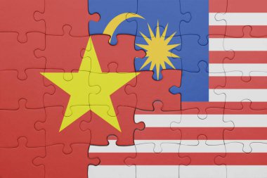 Vietnam 'ın renkli ulusal bayrağı ve Malezya bayrağı ile bulmaca. konsept