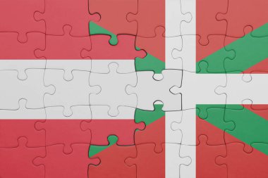 Bask ülkesinin renkli ulusal bayrağı ve Avusturalya bayrağının bulmacası. konsept
