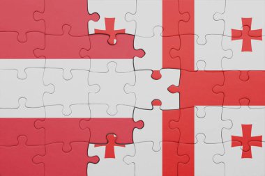 Gürcistan 'ın renkli ulusal bayrağı ve Avusturya bayrağıyla ilgili bulmacalar. konsept