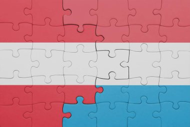 Lüksemburg 'un renkli ulusal bayrağı ve Avusturya bayrağıyla ilgili bulmacalar. konsept