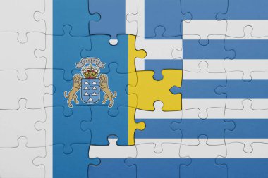 Yunan bayrağı ve kanarya adalarının bayrağıyla dolu renkli bir bulmaca. konsept