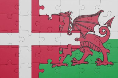 Galler 'in renkli ulusal bayrağı ve Danimarka bayrağı ile bulmaca. konsept