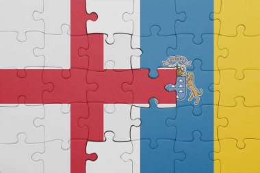 Kanarya adalarının renkli ulusal bayrağı ve İngiltere bayrağıyla ilgili bulmacalar. konsept