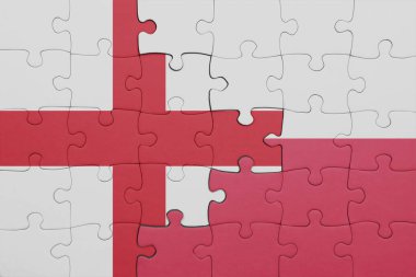 Polonya ve İngiltere bayrağının renkli ulusal bayrağıyla bulmaca. konsept