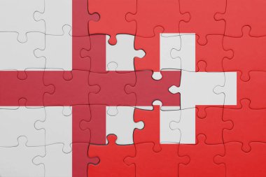 İsviçre 'nin renkli ulusal bayrağı ve İngiltere bayrağının bulmacası. konsept