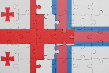 Gürcistan 'ın renkli ulusal bayrağı ve Faroe Adaları bayrağı ile ilgili bulmacalar. konsept