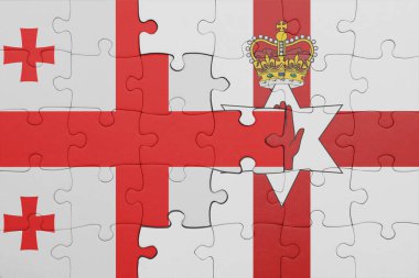 Gürcistan 'ın renkli ulusal bayrağı ve Kuzey İrlanda bayrağının bulmacası. konsept