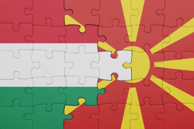 Macedonia 'nın renkli ulusal bayrağı ve Hungary bayrağı ile bulmaca. konsept