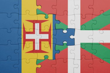 Bask ülkesinin renkli ulusal bayrağı ve madeira bayrağının bulmacası. konsept