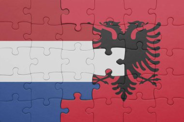 Albania 'nın renkli ulusal bayrağı ve Hollanda bayrağıyla ilgili bulmacalar. konsept