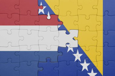 Bosna ve Herzegovina 'nın renkli ulusal bayrağı ve Hollanda bayrağı. konsept